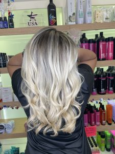 Balayage example, Blonde woman rear view with long hair