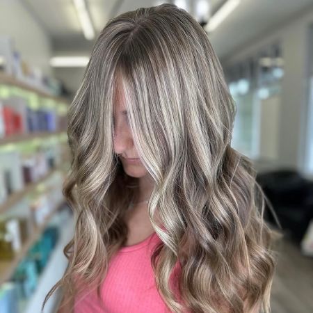 Long blonde hair with highlights shown from the front.